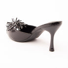 Black mules for women, back view showing the heel