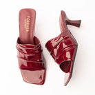 Maroon patent mules for women with a cushioned footbed