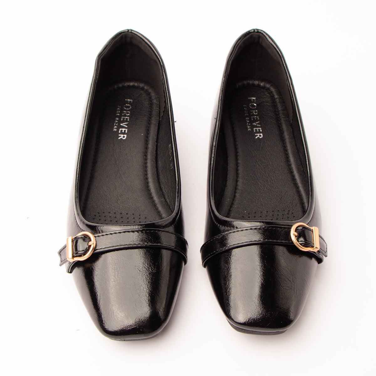 Black buckle ballerinas styled for everyday wear