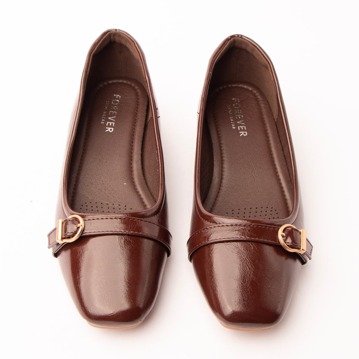 Brown buckle ballerinas styled for everyday wear