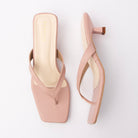 Peach toe-post kitten heel mules for women, both shoes laid flat