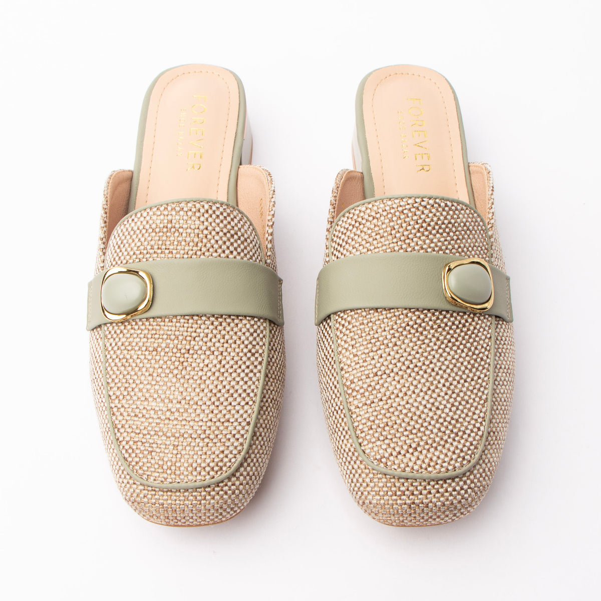 Green woven loafer mules styled for everyday wear