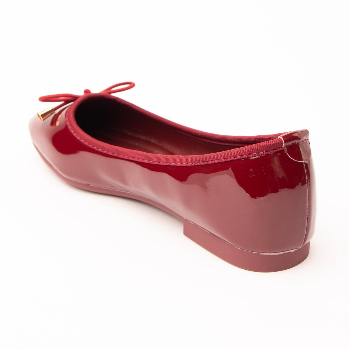 Maroon patent ballerina flats for women, back view showing the heel counter