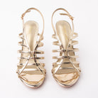 Gold sandals for women, both shoes from the front