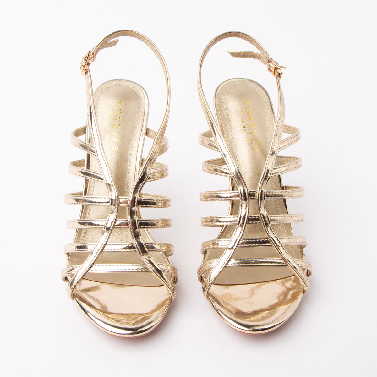 Gold sandals for women, both shoes from the front