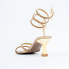 Gold block heel sandals styled for party wear