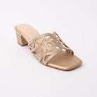 Gold cut out block heel mules styled for party wear