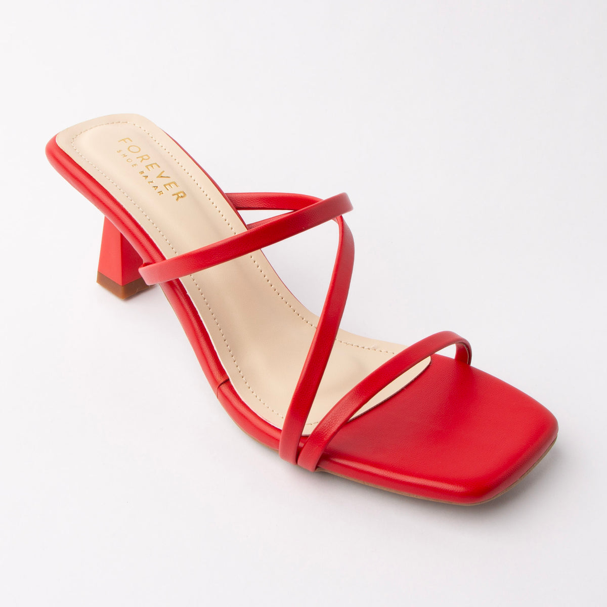 Red mules for women, three-quarter view