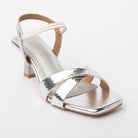 Silver kitten heel sandals styled for casual wear