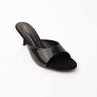 Black snake print kitten heel mules styled for casual wear