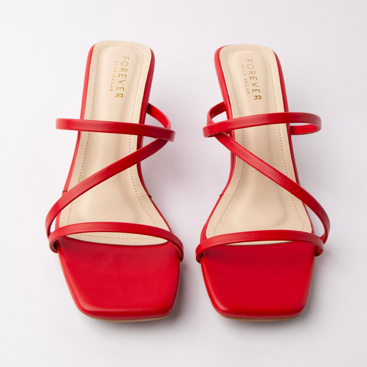 Red mules for women, both shoes from the front