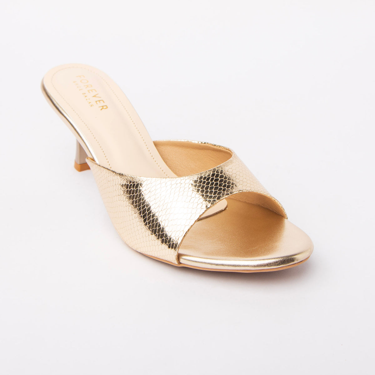 Gold snake print kitten heel mules styled for casual wear