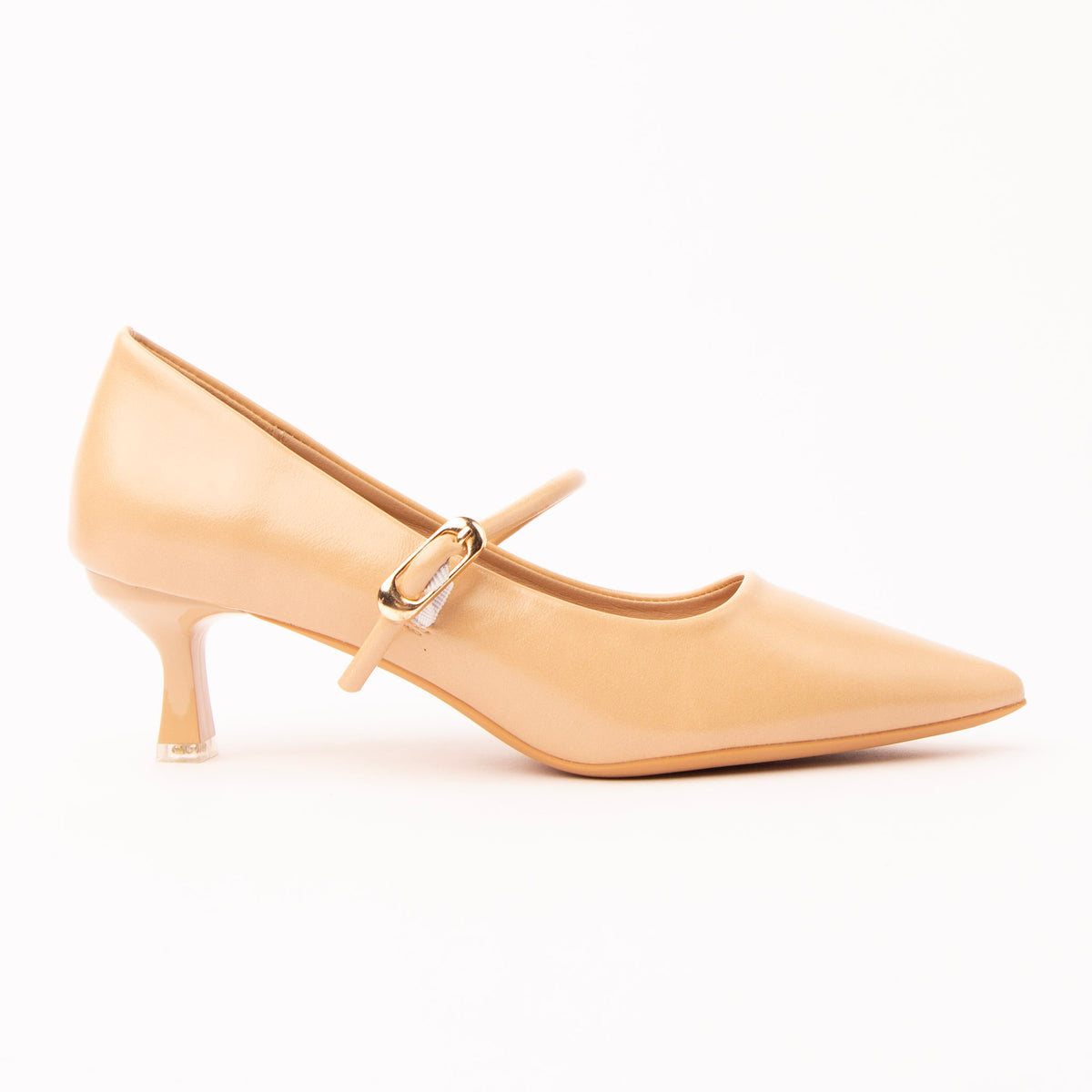 Beige mary jane kitten heels for women, a warm nude-beige Mary Jane with a soft satin sheen and a long sharply pointed toe, a narrow instep strap through a slim gold buckle, on a flared spool heel tipped with a clear block