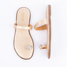 Gold embellished ballet flats styled for everyday casual wear