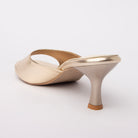 Gold snake print kitten heel mules for women, one wide light-gold snake-embossed band crosses the vamp and is edged in smooth mirror-gold binding that also wraps the topline and platform rim, over a cream footbed and a matte champagne flared hourglass kitten heel capped with a natural tan tip
