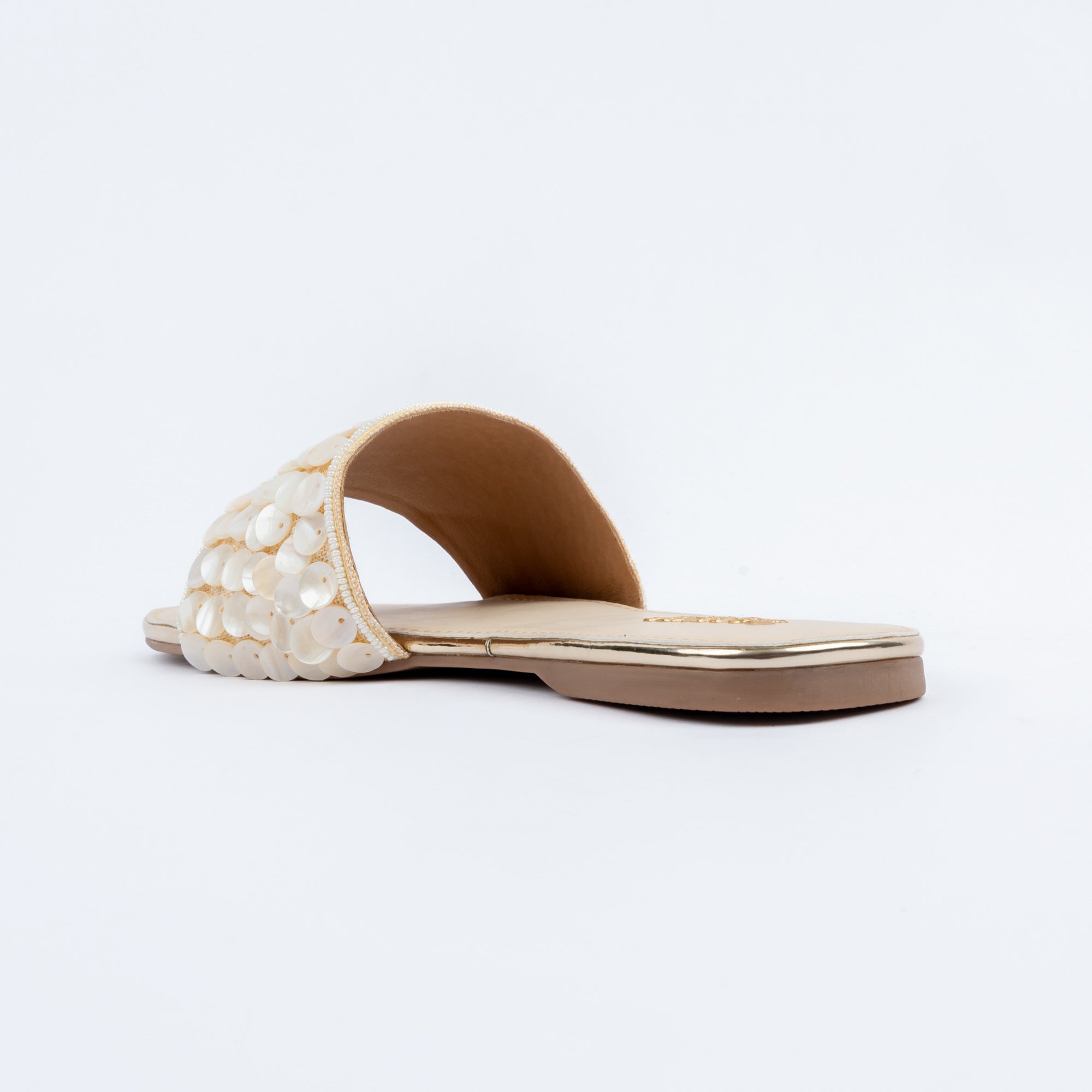 Gold flats for women with cushioned footbed, side view