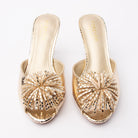 Gold mules for women, both shoes from the front