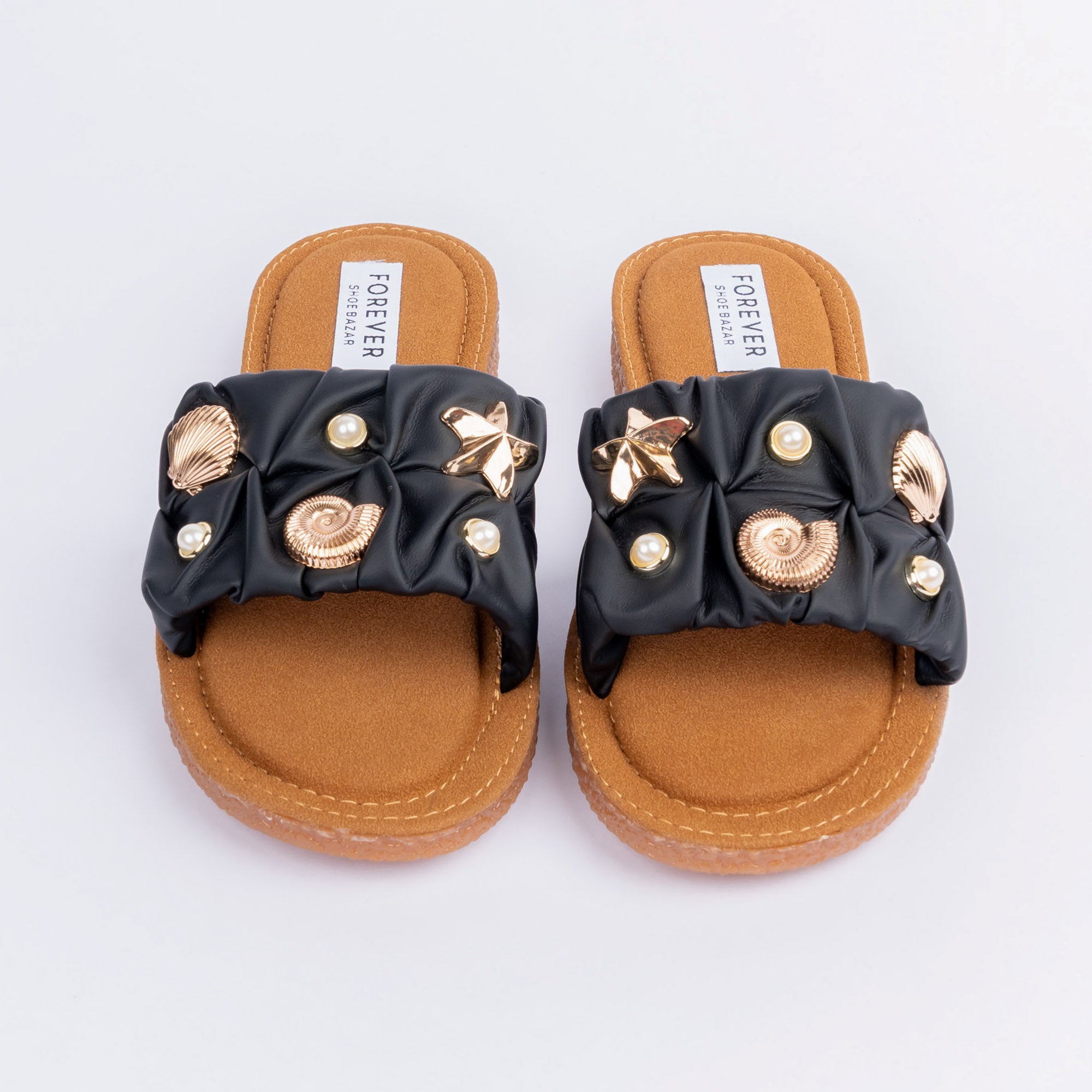 Black ruched ballet flats styled for everyday casual wear