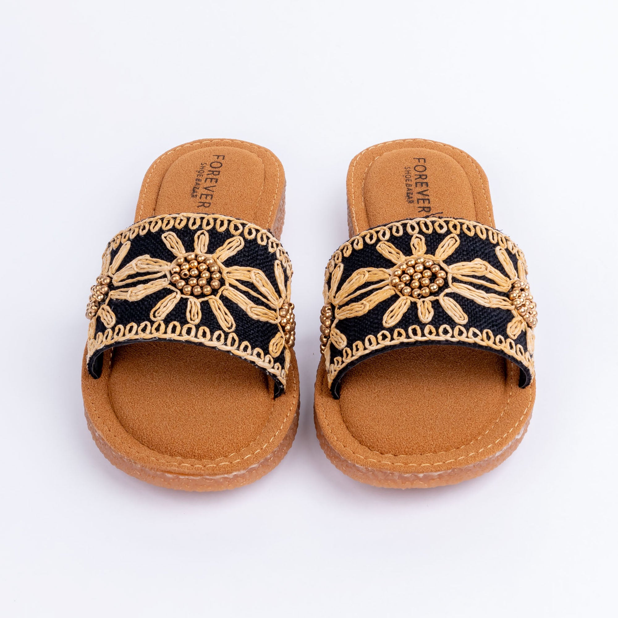 Black crochet ballet flats styled for everyday casual wear