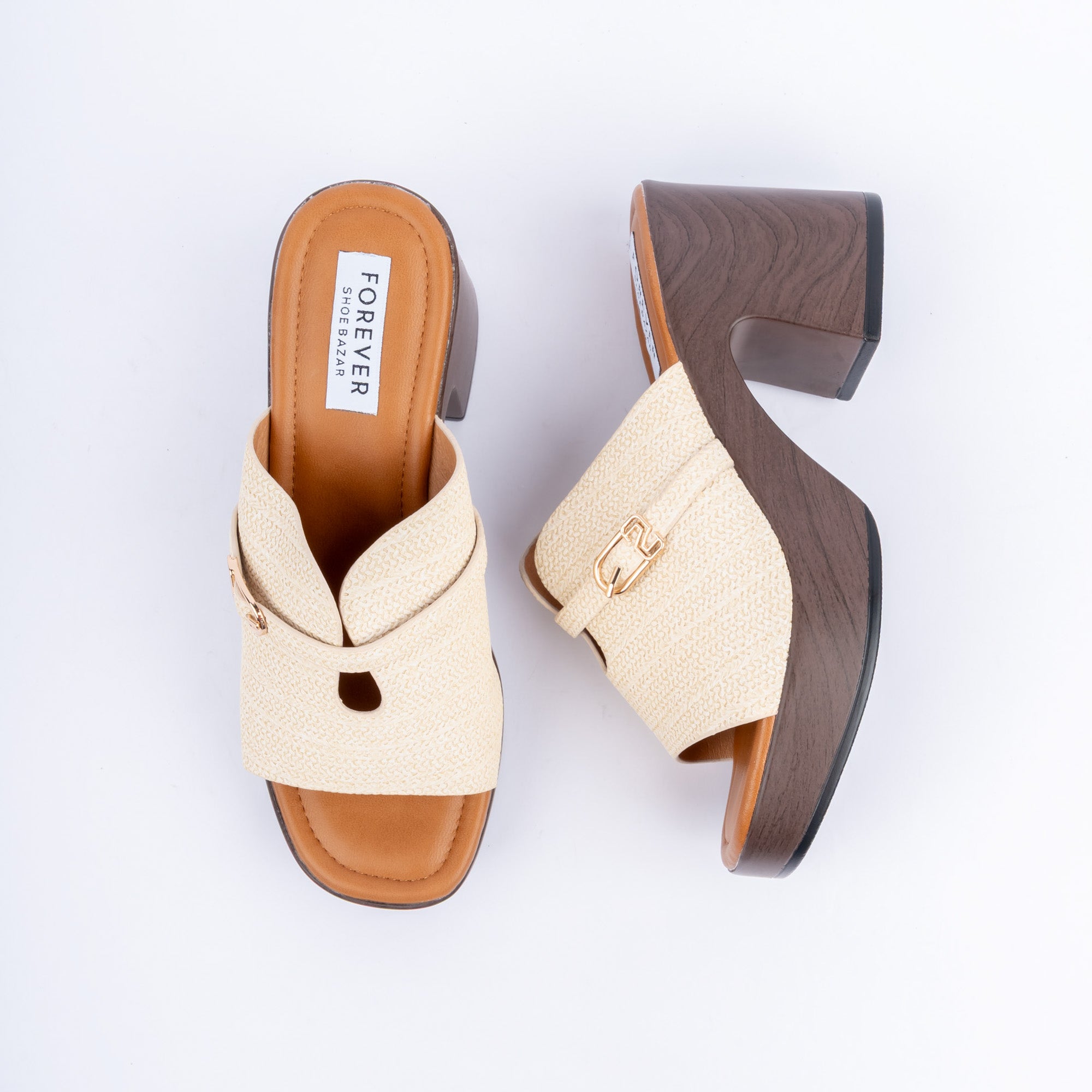 Beige platform heel mules for women, a woven raffia-look band crossed by a gold buckle strap