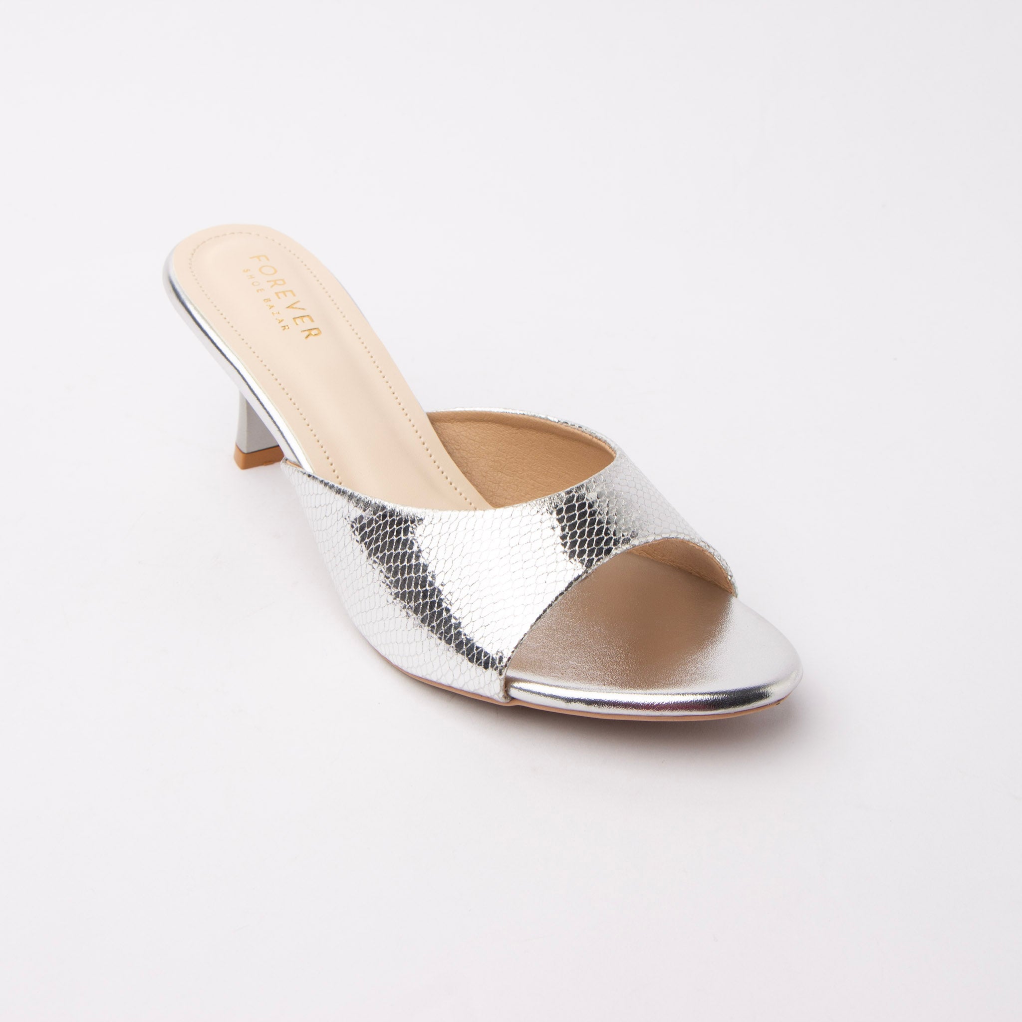 Silver snake print kitten heel mules styled for casual wear