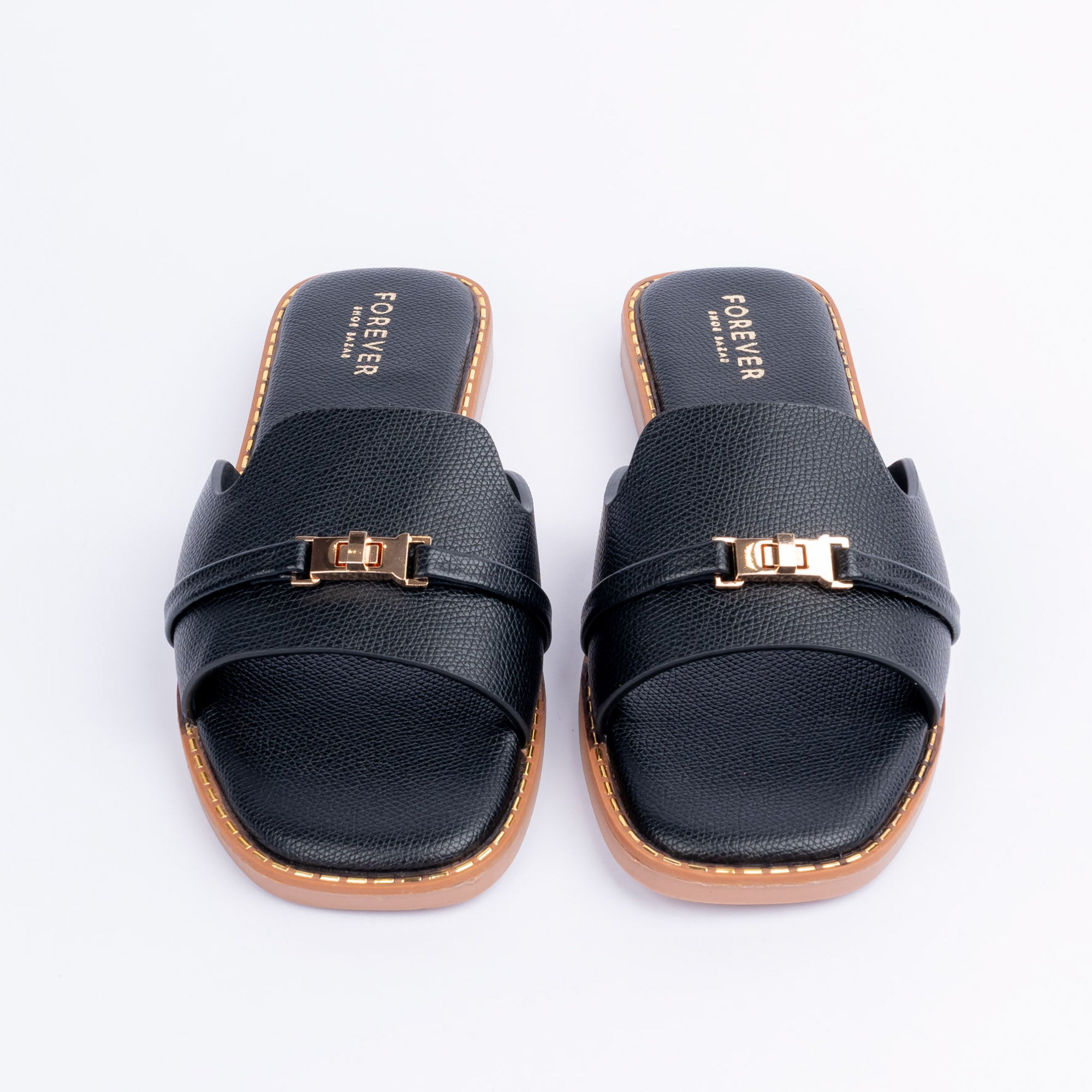 Black textured ballet flats styled for everyday casual wear