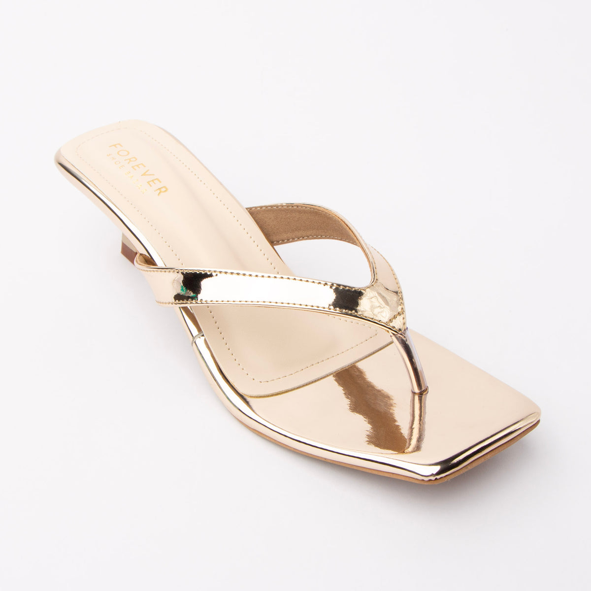 Gold toe-post kitten heel mules for women, three-quarter view