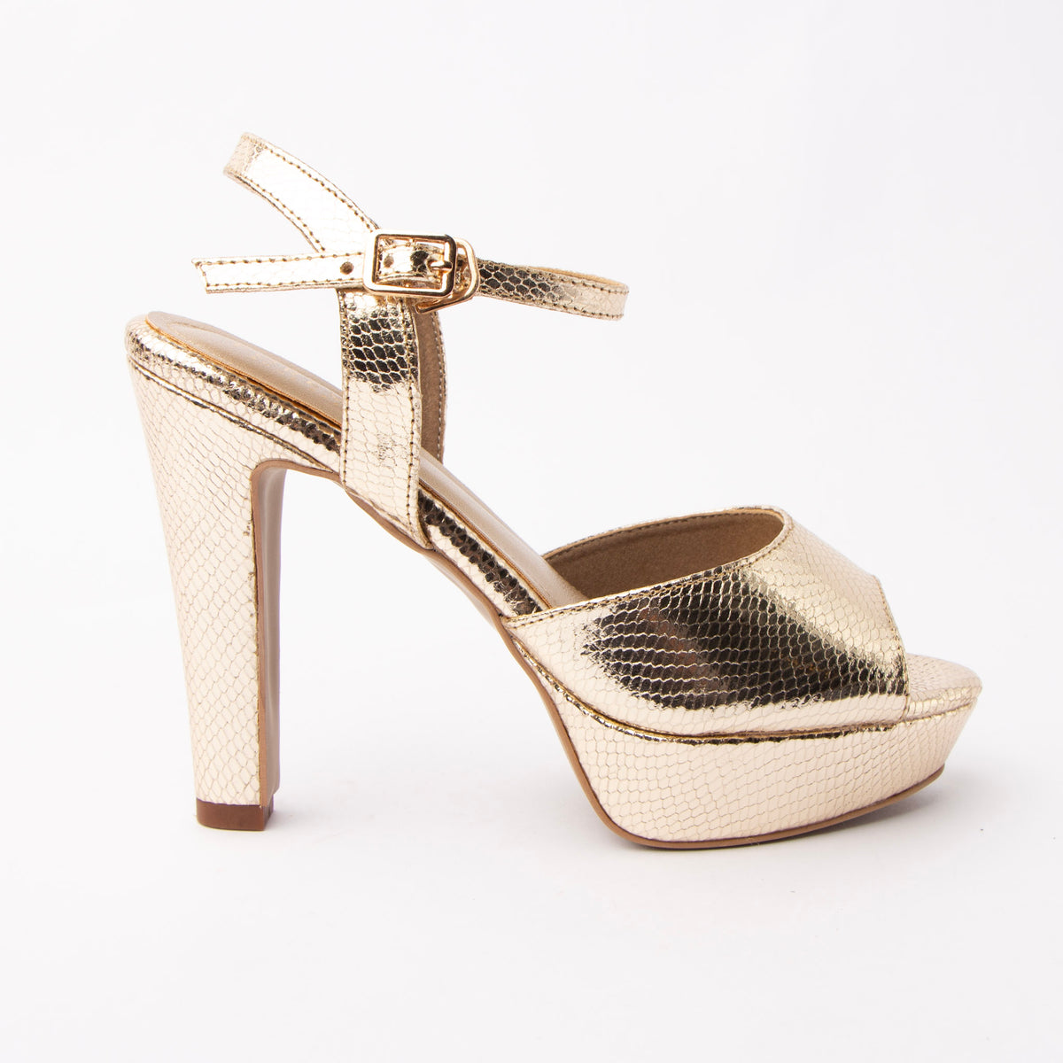 Gold peep toe platform heels styled for casual wear