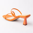 Orange mules for women, back view showing the heel