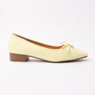 Yellow pumps for women, side view
