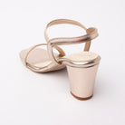 Gold embellished block heel sandals for women with cushioned footbed, side view