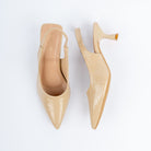 Beige pumps for women, a glossy croc-embossed upper with a low-cut V vamp tapering to a long pointed toe, held by a slim elasticated slingback, on a slender flared spool heel