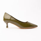 Green pointed court shoes for women, a deep olive-green pointed court with a lightly antiqued sheen darkening towards the toe and heel, on a sculpted kitten heel capped in silver-tone metal