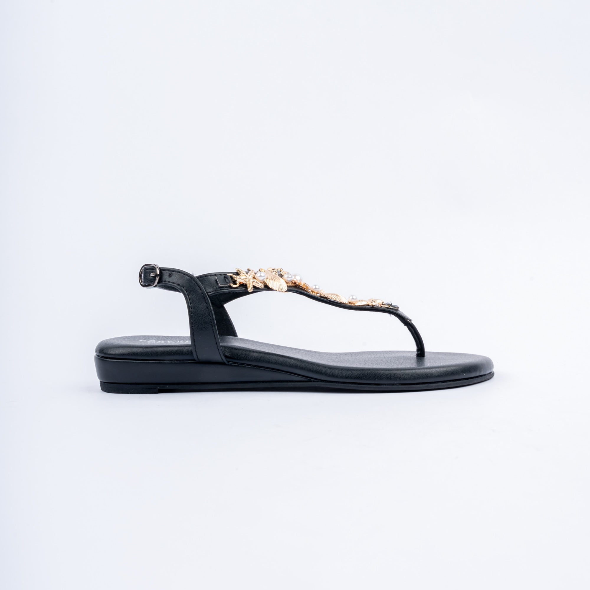 Black flat sandals for women with cushioned footbed, side view