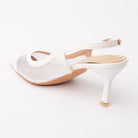 White pumps for women, back view showing the heel