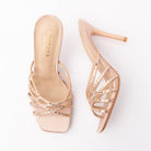 Nude mules for women, both shoes laid flat