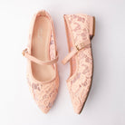 Pink Mary Janes for women, both shoes laid flat
