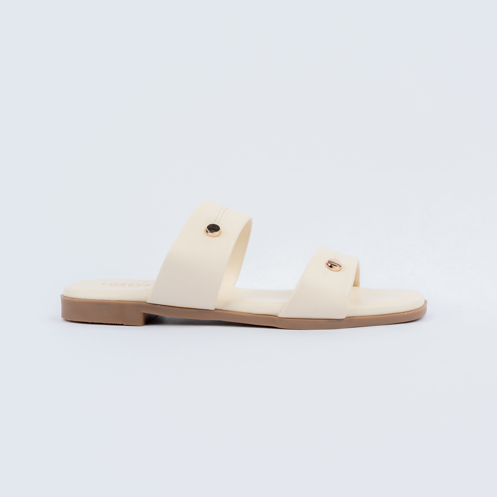 Cream dual strap ballet flats styled for everyday casual wear