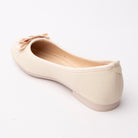 Beige bow ballerina flats for women, back view showing the heel counter