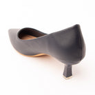Navy blue pointed kitten heels for women, back view showing the heel