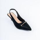 Black pumps styled for casual wear