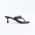 Black slim heel mules for women, a chevron-beaded panel narrowing to a slim toe post