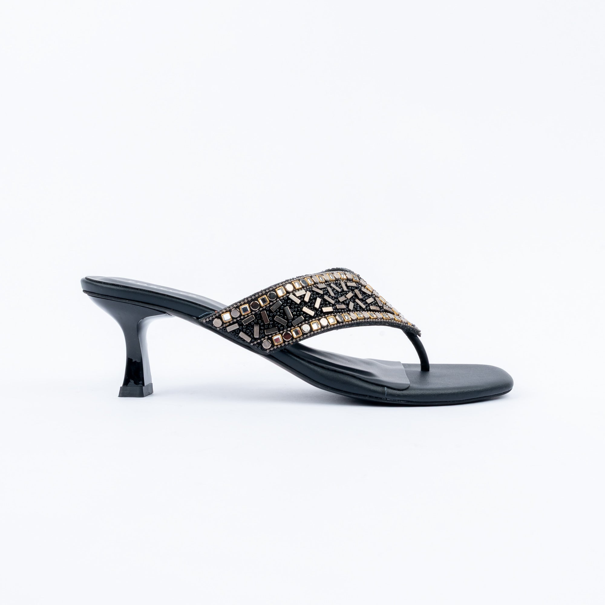 Black slim heel mules for women, a chevron-beaded panel narrowing to a slim toe post