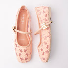 Pink flats for women, both shoes laid flat