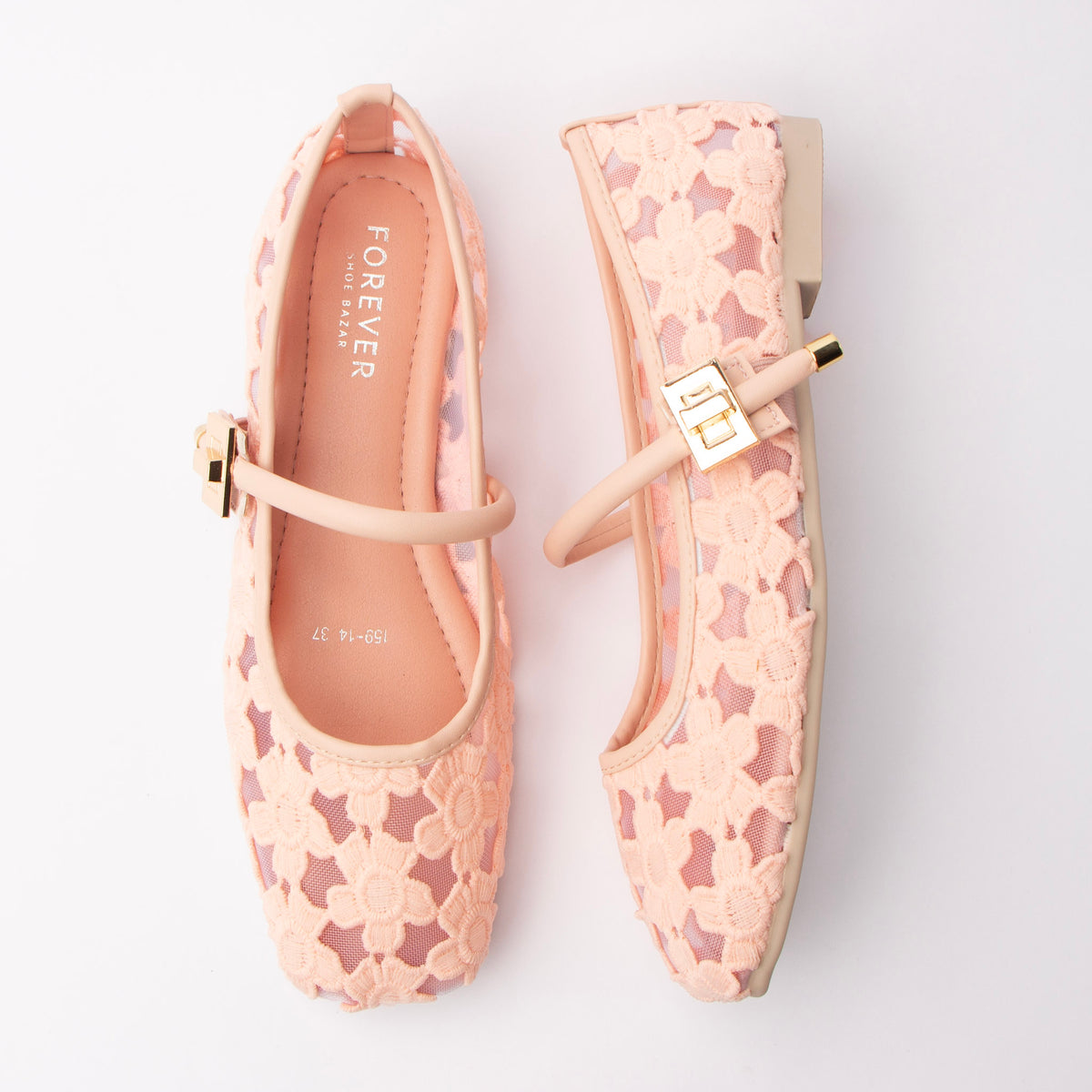 Pink flats for women, both shoes laid flat