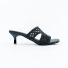Black kitten heel mules for women, an H-shaped upper of chunky basket-weave braid with an open lattice cut-out over the instep, a smooth footbed, and a flared kitten heel finished with a pale gold metal tip