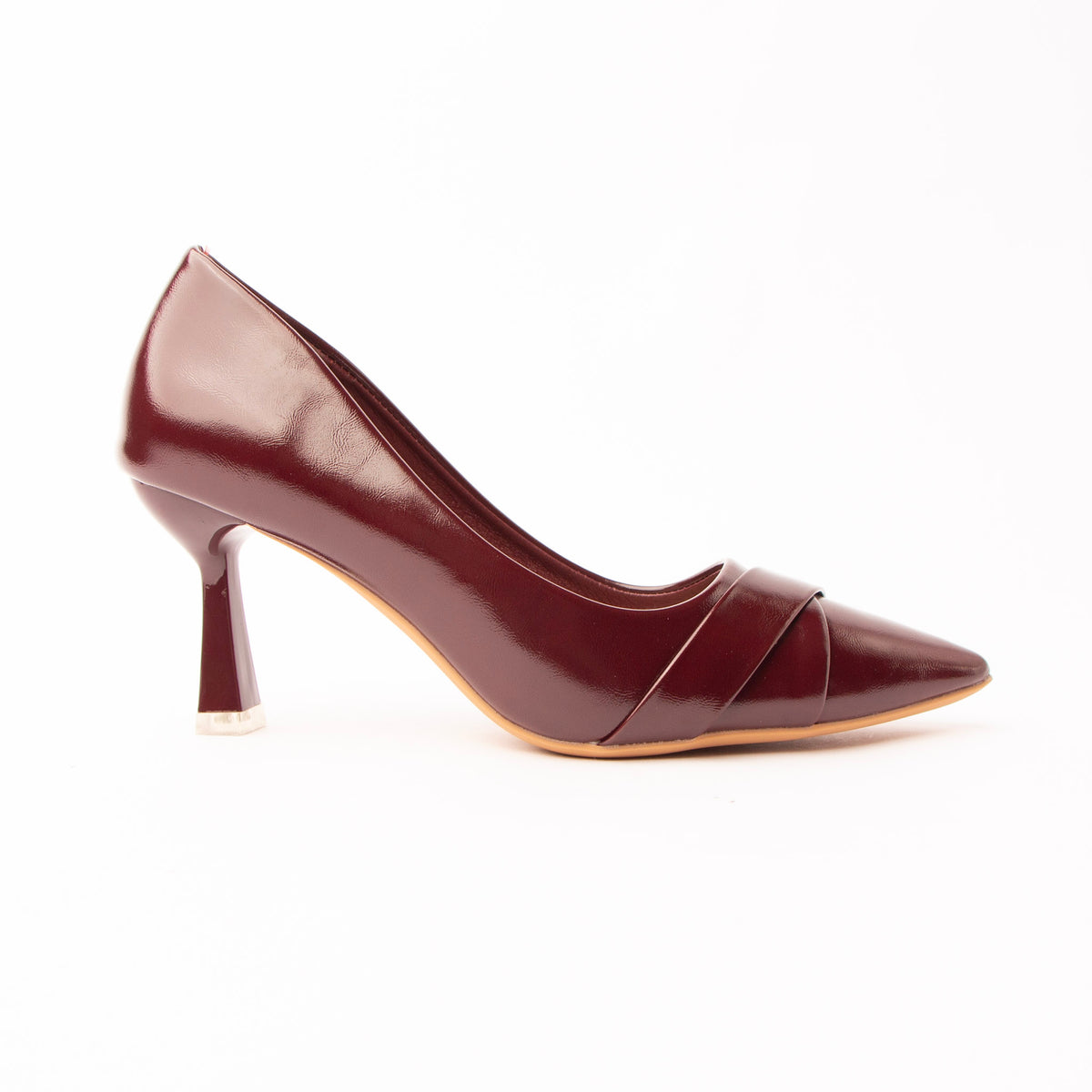 Maroon folded strap pumps for women, a deep oxblood-burgundy court in high-shine crinkled patent, its toe box wrapped by two wide folded bands crossing into a shallow V, on a slender flared hourglass heel tipped in pale silver