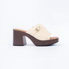 Beige platform heel mules for women with cushioned footbed, side view