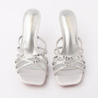 Silver mules for women, both shoes from the front