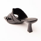 Black patent mules for women, back view showing the heel